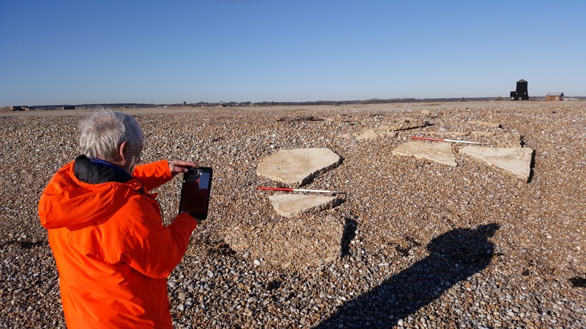 A CITiZAN volunteer updates the record for the police tower base, Orford Ness