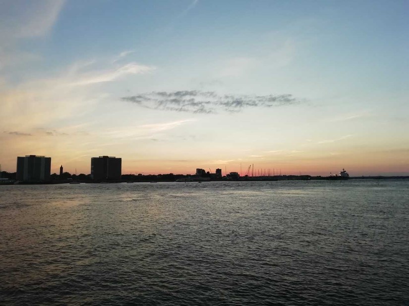 The entry to Portsmouth Docks at sunset