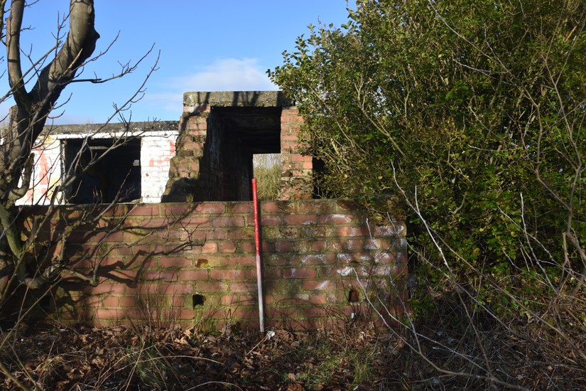 Blast wall protecting the entrance to the crew shelter