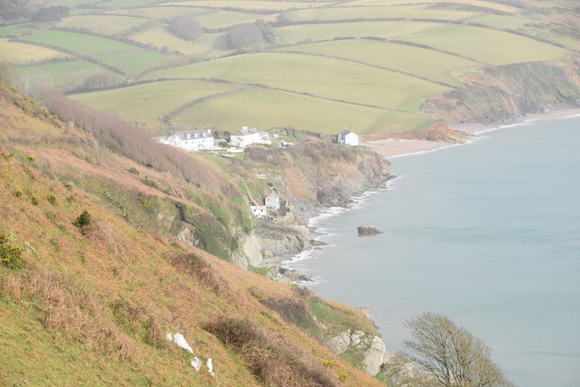 Photo showing the destruction of Hallsands, a fishing village destroyed by coastal erosion caused by human commercial activity